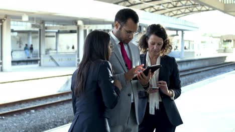 Group-of-business-colleagues-with-digital-tablet